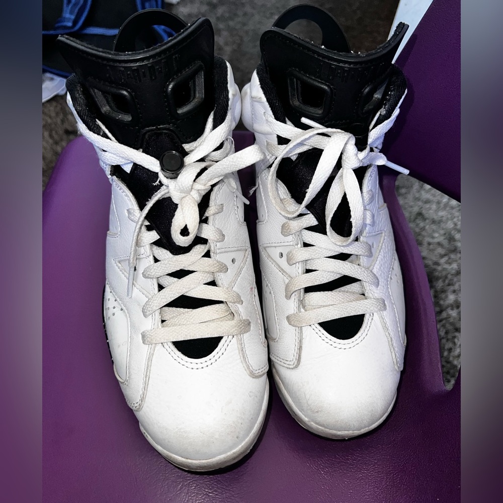 Authentic Men’s White and Black Retro Jordan 6 Sneakers. Size: 7.5/ Women’s: 9
